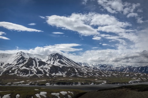 Denali Mountain is behind the cloud on the right